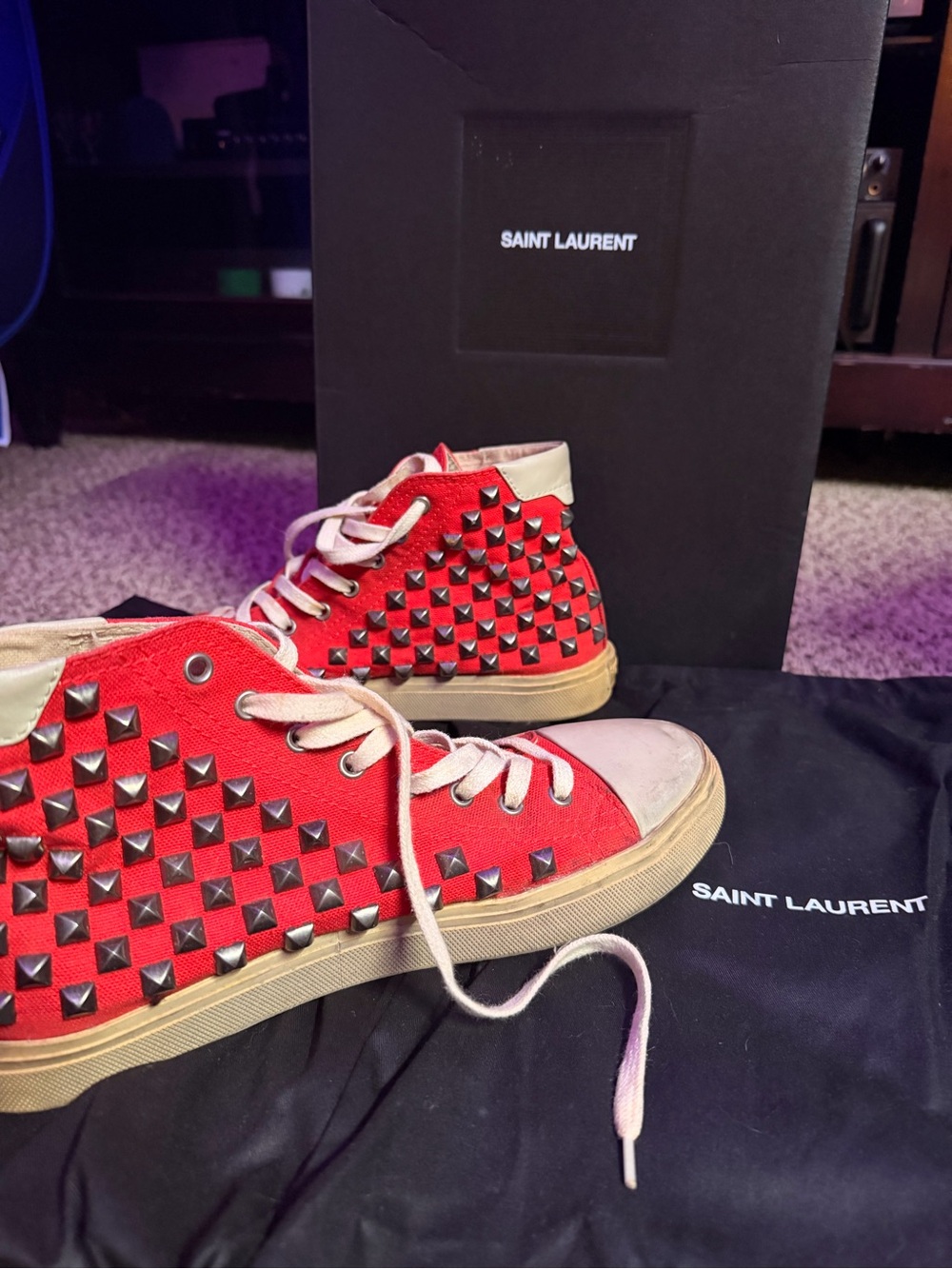 Saint Laurent Red Canvas High-Top Sneakers with Silver Studs.